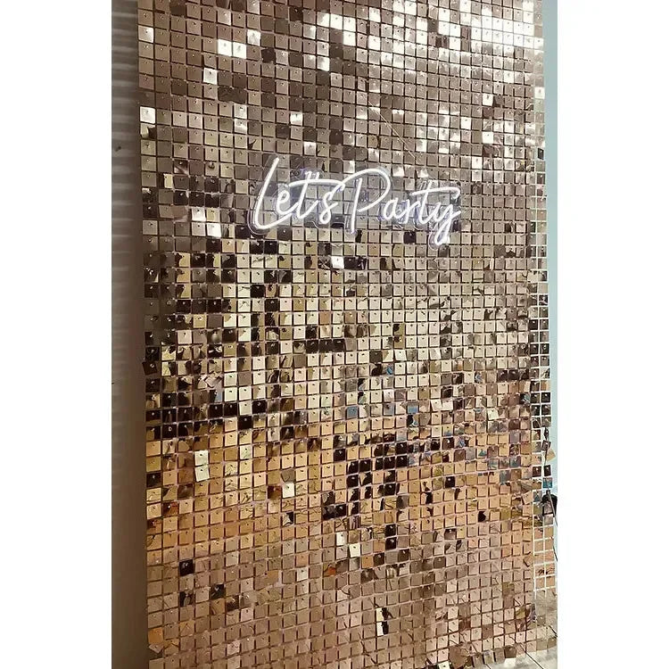 Rose gold Shimmer wall hire with neon signage - Balloonz