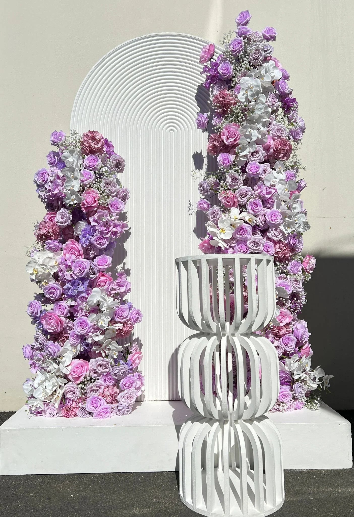 Purple Flower Arrangements and backdrop - Balloonz