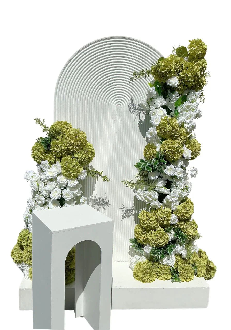 Green and white floral and ripple backdrop arrangements. - Balloonz