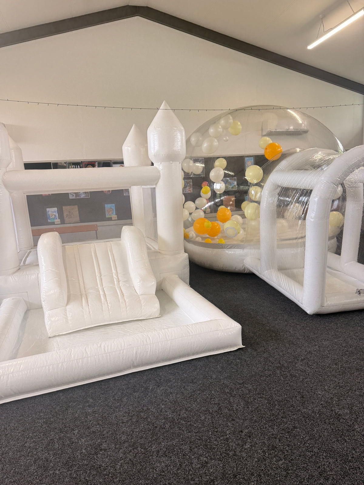 White bouncy castle and clear Bubble House combo hire by Balloonz Auckland
